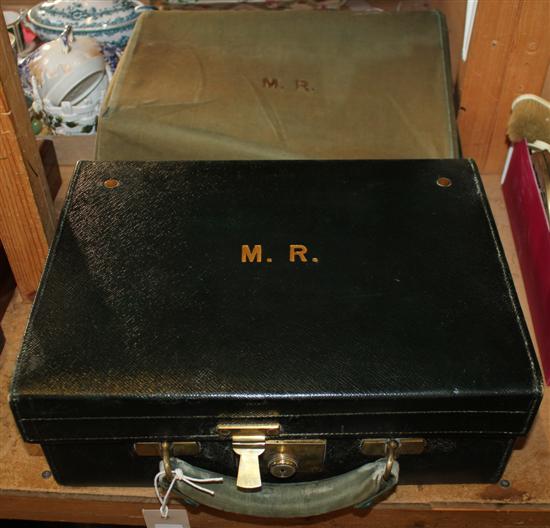 Leather travelling case with silver topped bottles